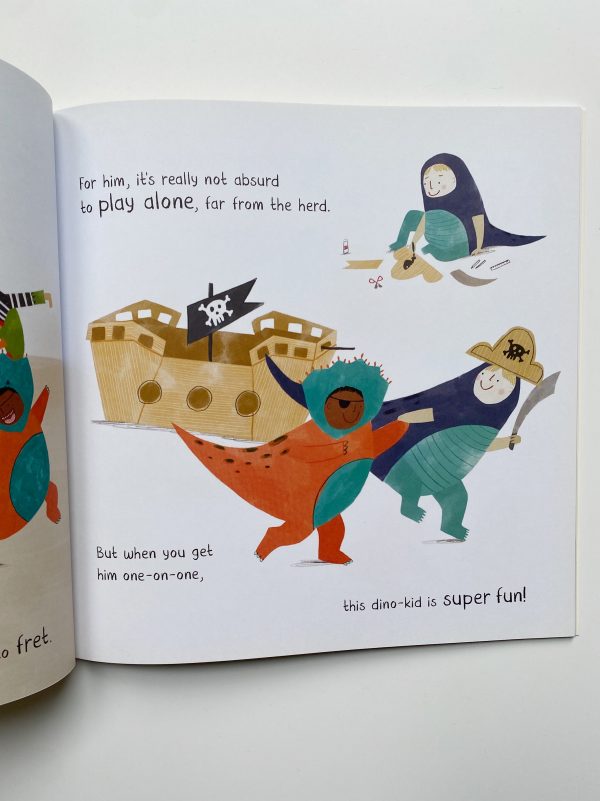 The image shows a page out of I’m a Feel-O-Saur book. There is an illustration of two dinosaurs dressed as pirates playing. There is also an illustration of a pirate ship. The page has a white background and there are a few lines of text written in a black typeface.