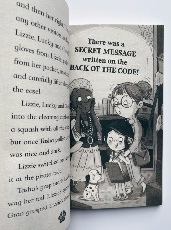 The image shows a page spread from Lizzie and Lucky. The pages have a cream background and the text is written a large black typeface. There are black and white illustrations.